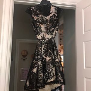 Black lace dress with nude lining underneath